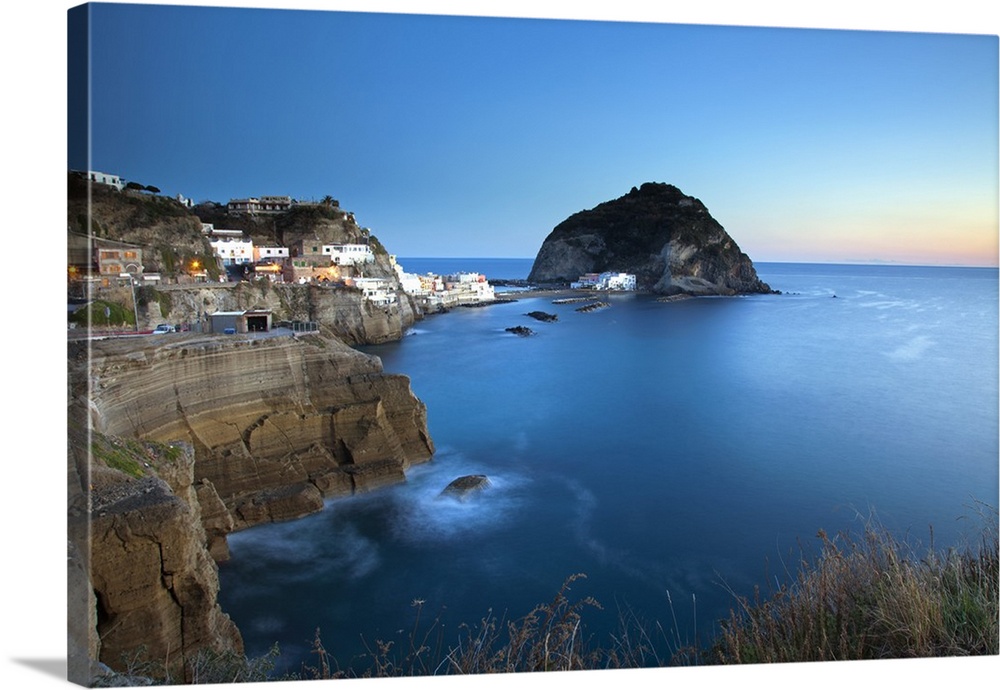 Southern Italy, Campania, Ischia. The unique fisherman village of Sant Angelo with houses carved from lava.