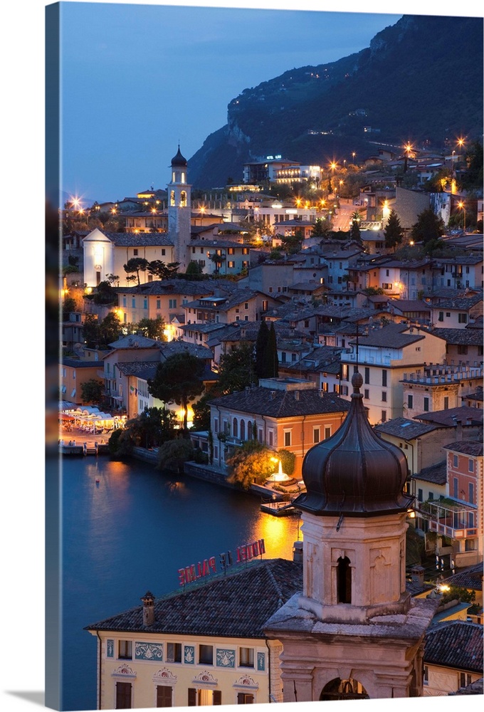 Italy, Lombardy, Lake District, Lake Garda, Limone sul Garda, aerial town view, dusk