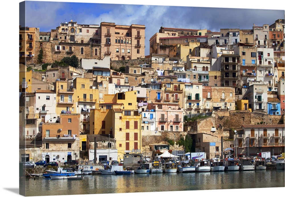 Italy, Sicily, Sciacca. The port with the houses in the historic centre.