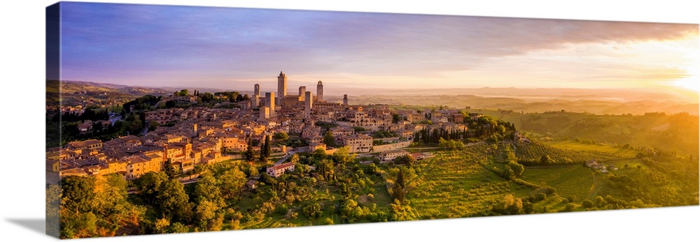 Italy, Tuscany, Val d'Elsa. Panoramic aerial view of the medieval village of San Gimignano, a UNESCO World Heritage Site.