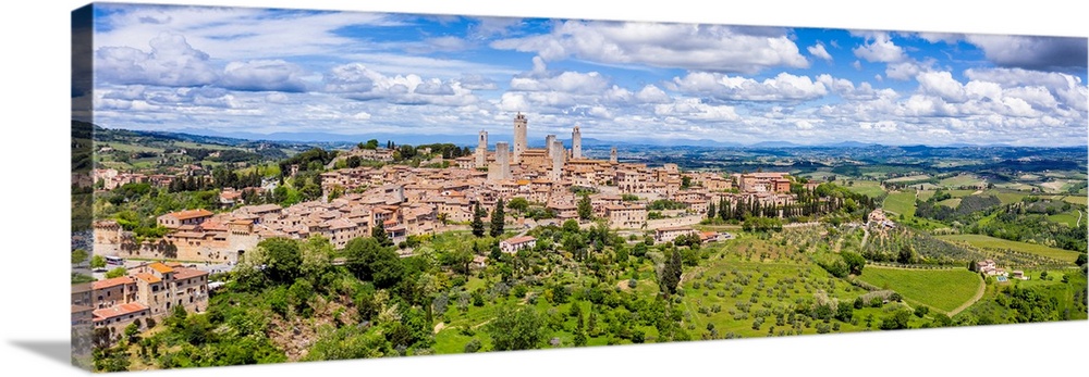 Italy, Tuscany, Val d'Elsa. Panoramic aerial view of the medieval village of San Gimignano, a UNESCO World Heritage Site.