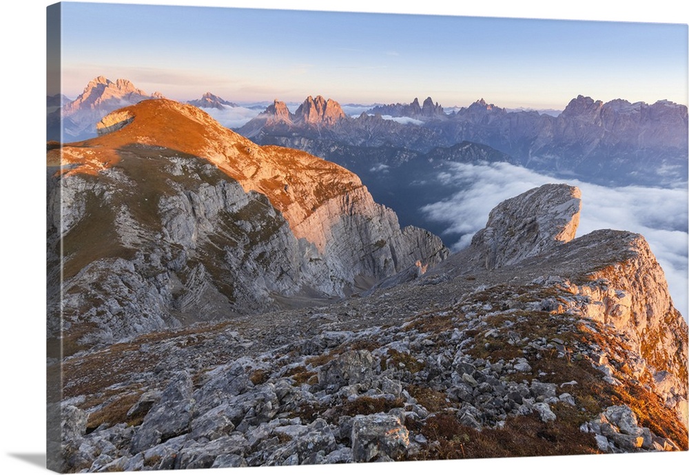 Europe, Italy, Veneto, Cadore, Auronzo. Sunrise with sea of clouds from Camosci peak, Marmarole. Croda Alta di Somprade in...