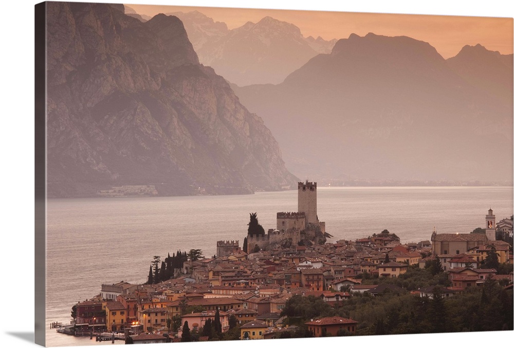 Italy, Veneto, Lake District, Lake Garda, Malcesine, aerial town view, dawn