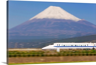 Japan, Honshu, Shinkansen (Bullet train) passing Mount Fuji
