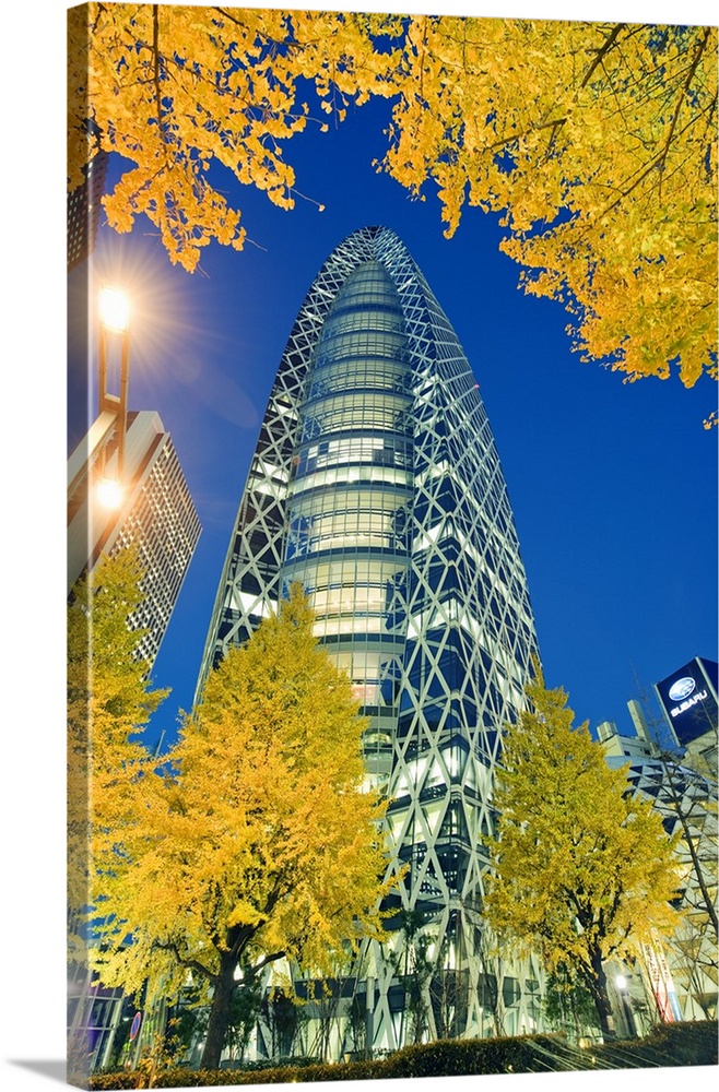 Asia, Japan, Tokyo, Shinjuku, Tokyo Mode Gakuen Cocoon Tower, Design School building, yellow ginkgo leaves.