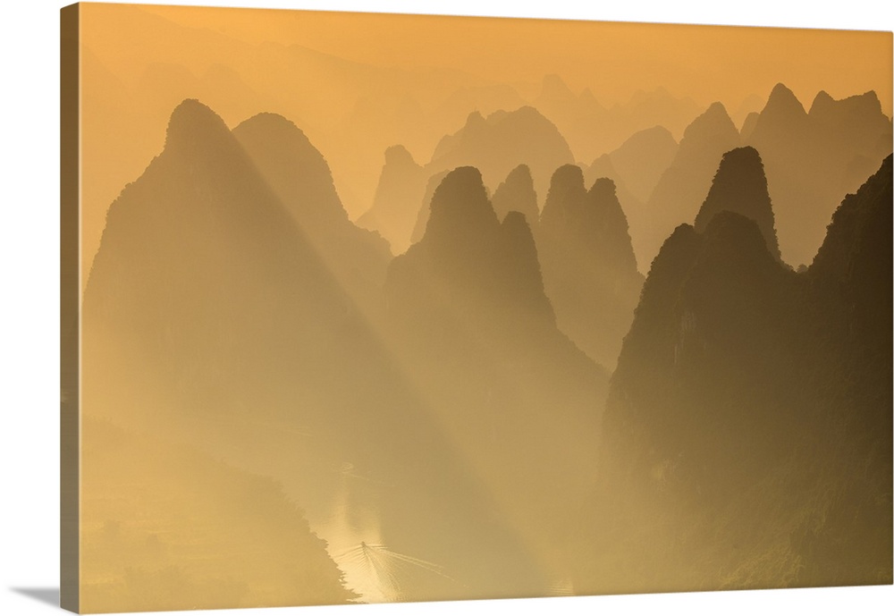 Karst limestone peaks of Yangshou and the Li River, Guangxi-Yangshuo, China.