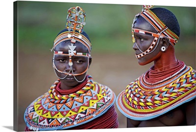 Kenya, Samburu girls dressed in her traditional beaded necklaces and headress at a dance
