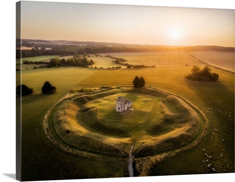 Knowlton Church and earthworks from the air at sunrise, Knowlton, Dorset, England, UK