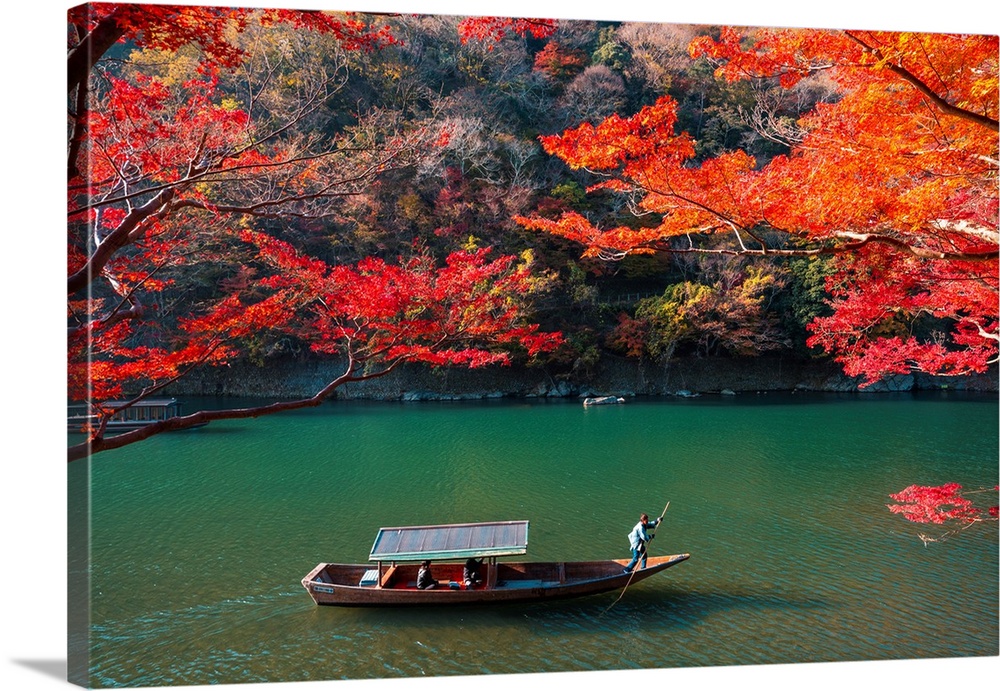 Kyoto, Kyoto prefecture, Kansai region, Japan. Tour boats along the Katsura river in autumn.