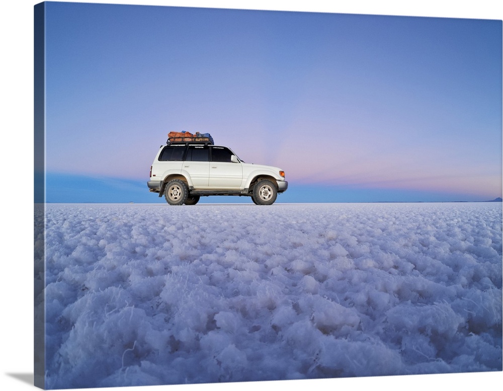 Bolivia, Potosi Department, Daniel Campos Province, White Toyota Landcruiser on the Salar de Uyuni, the largest salt flat ...