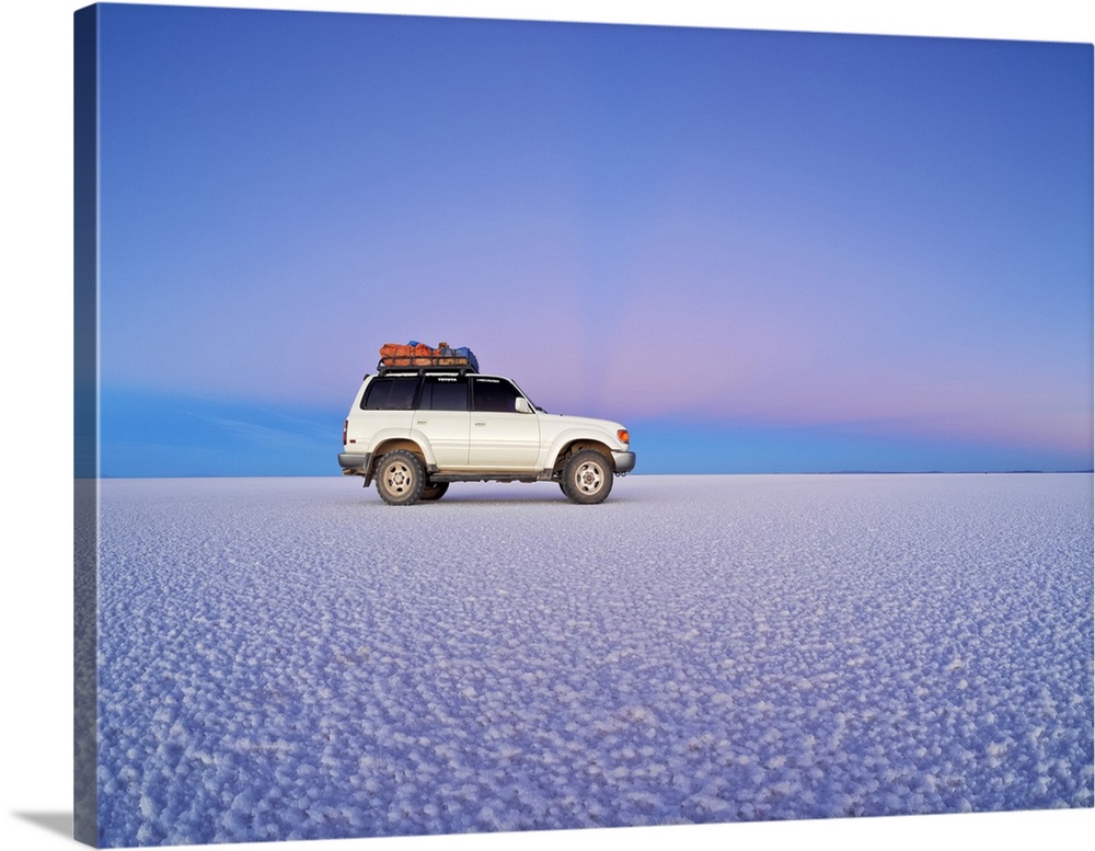 Bolivia, Potosi Department, Daniel Campos Province, White Toyota Landcruiser on the Salar de Uyuni, the largest salt flat ...