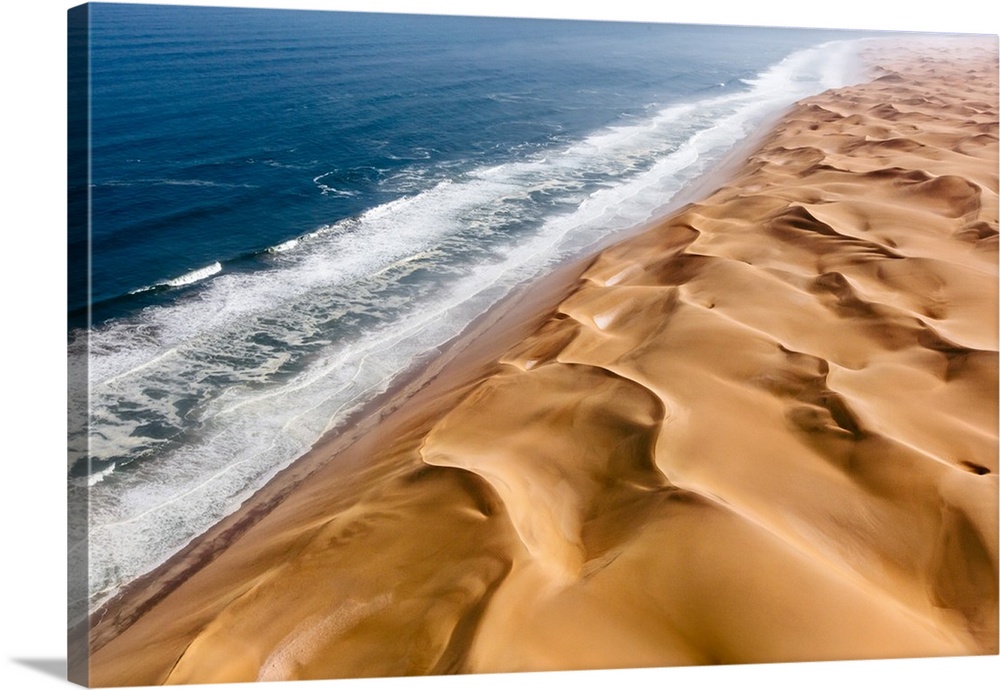 Langewand, Aerial view of where the Atlantic Ocean meets the sea of dunes in Western Namibia.