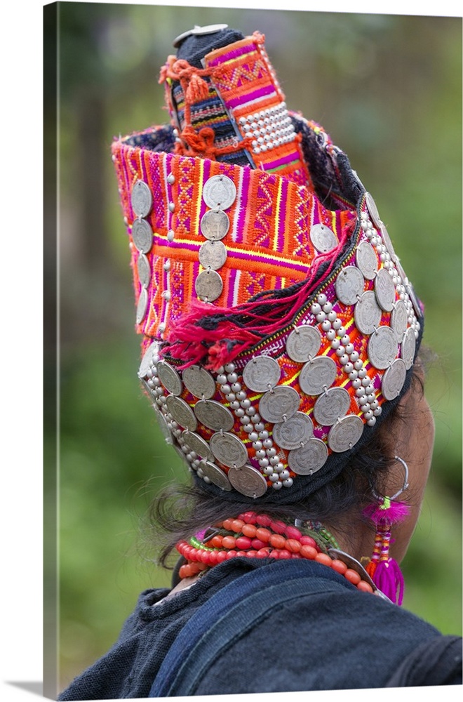 Laos, Pak Namnoy, Oudomxay Province. The tall decorated headdress of a woman from the minority Akha Pala people. Akha head...