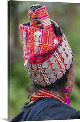 Laos, The tall decorated headdress of a woman from the minority Akha Pala people