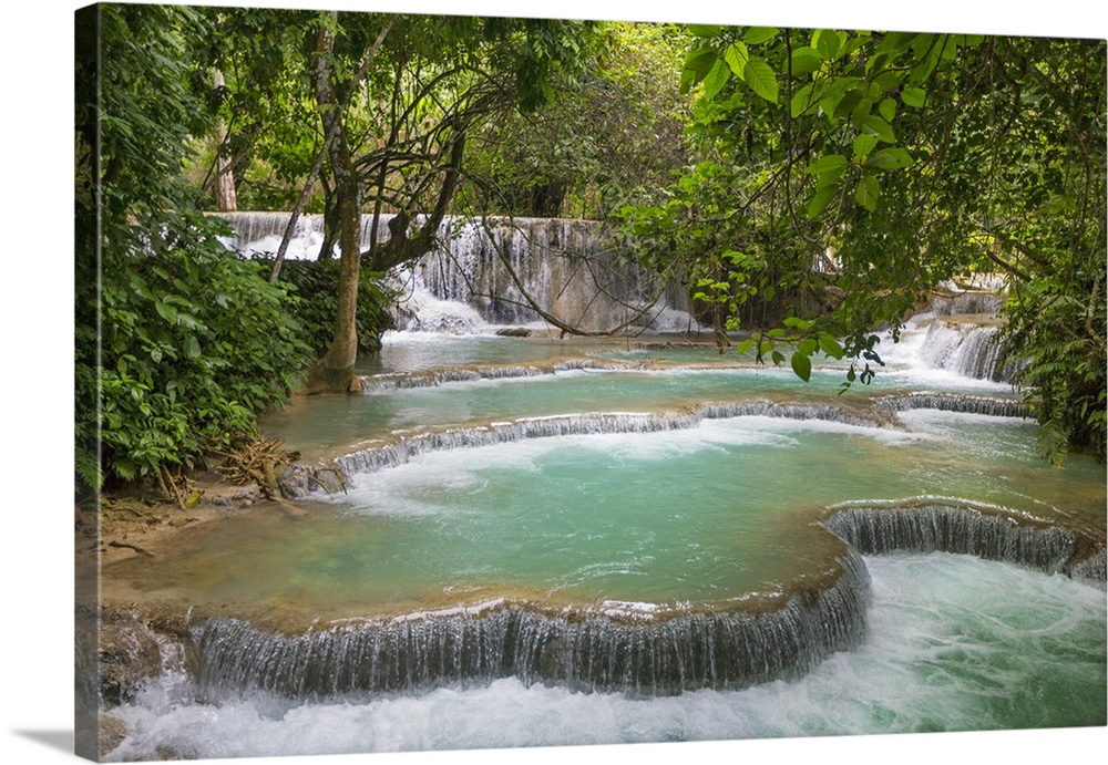 Laos, Kuang Si, Luang Prabang Province. The beautiful turquoise blue pools and waterfalls at Kuang Si are a popular touris...