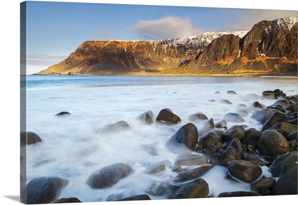 Lofoten islands, Norway, Europe. The last lights of the sunset on the beach.