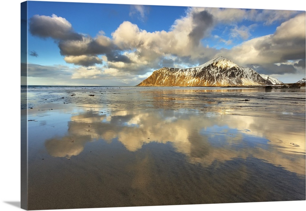 Lofoten, Norway. The famous beach with the last reflections at sunset.