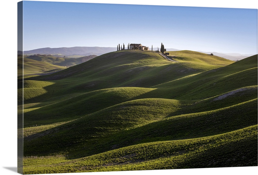 Lonely house into the hills in Asciano outskirt, Siena Province, Tuscany, Italy.