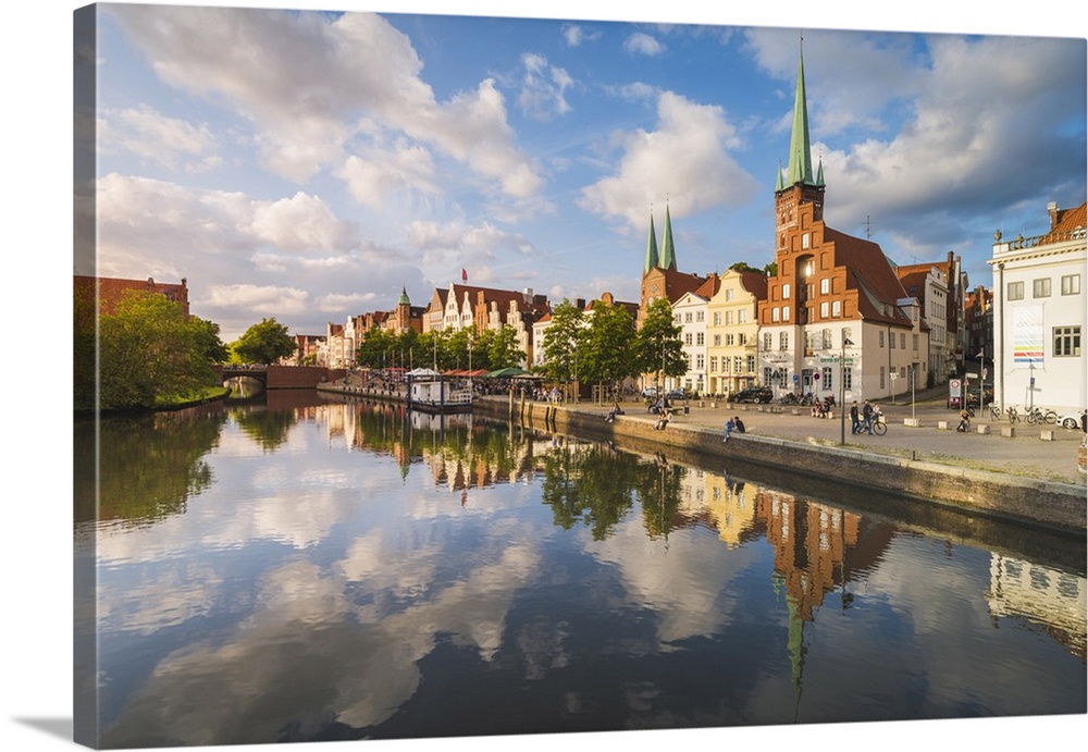 Lubeck, Baltic coast, Schleswig-Holstein, Germany. Old town's houses along the Trave river's waterfront.