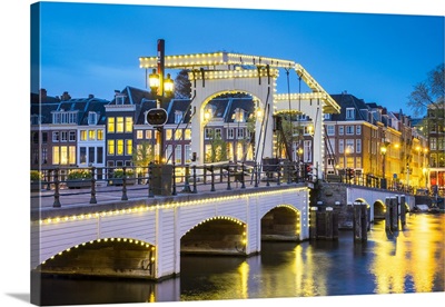 Magere Brug, Skinny Bridge, on the Amstel River at night, Amsterdam