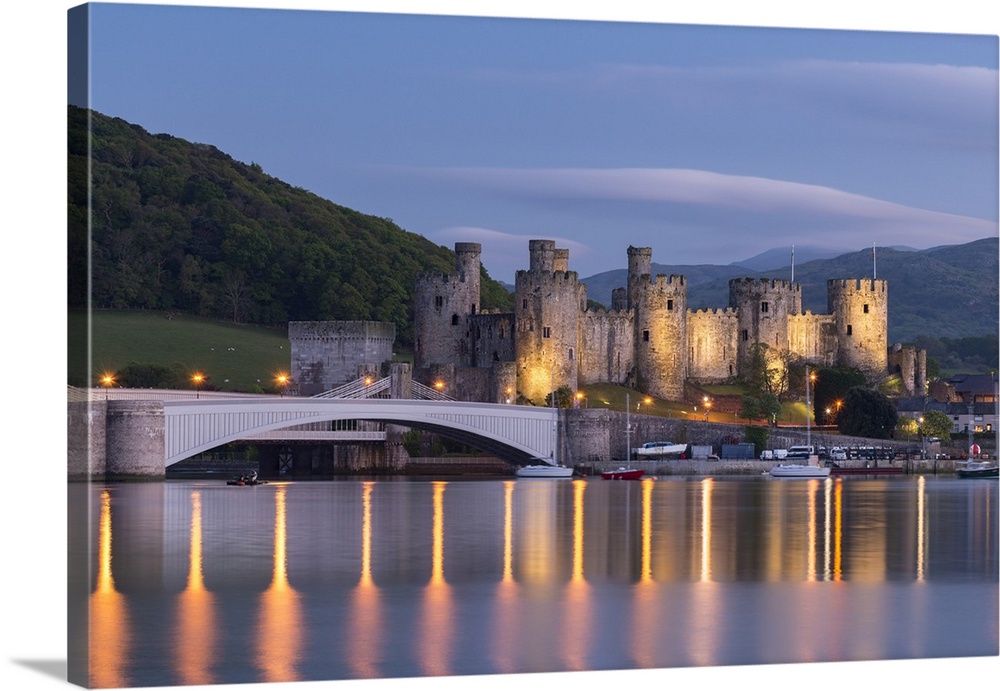 Majestic ruins of Conwy Castle in evening light, Snowdonia National Park, Wales, UK. Spring