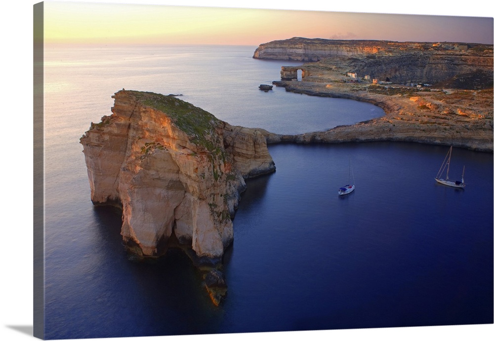 Malta, Gozo, Dwejra, 'Fungus Rock' Named so, because of the plant growing on it.