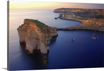 Malta, Gozo, Dwejra, 'Fungus Rock' Named so, because of the plant growing on it