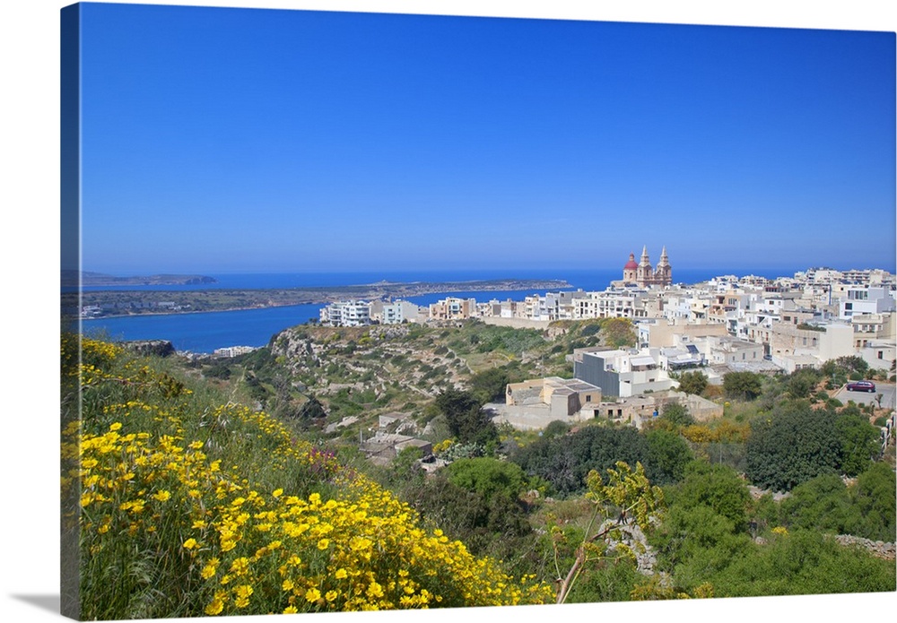 Europe, Maltese Islands, Malta. The village of Melllieha overlooking the sea.