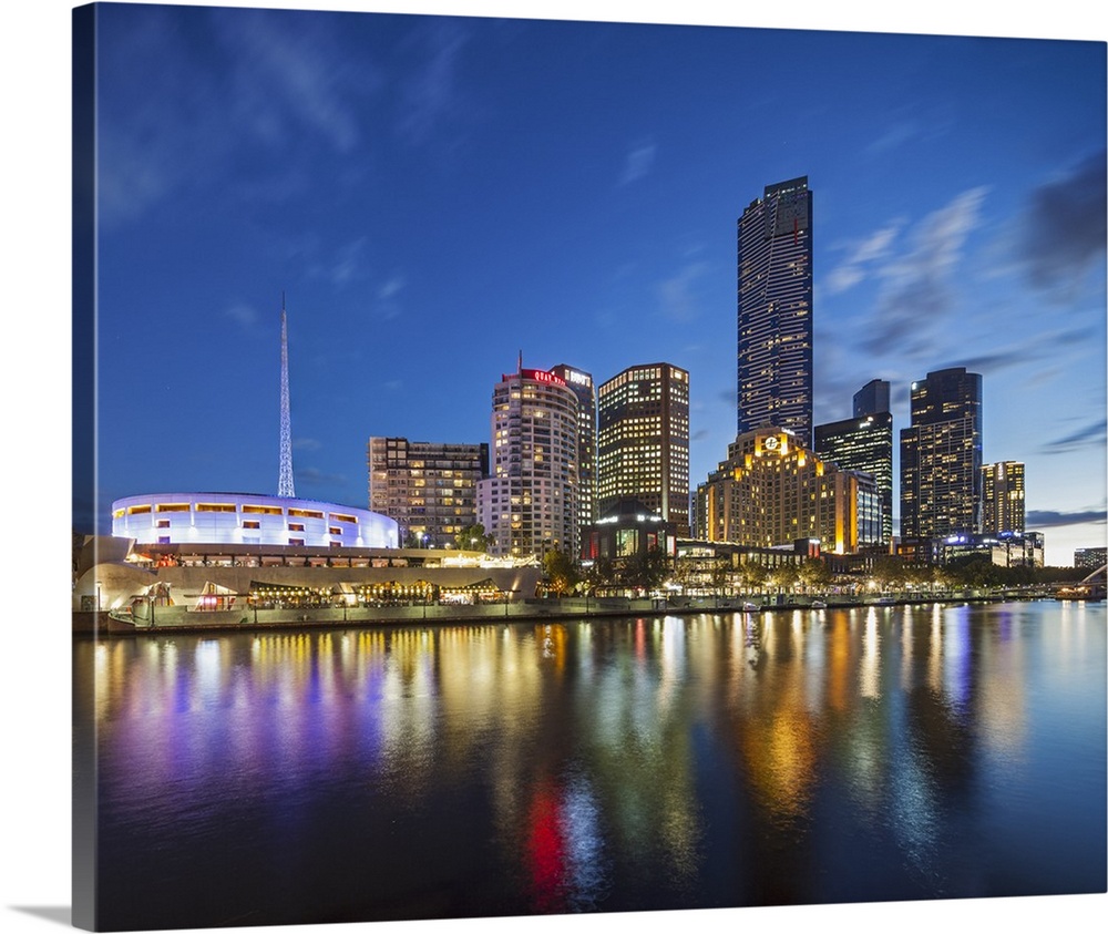 Melbourne Southbank skyline, Eureka Tower and Hamer Hall over the Yarra River at twilight.