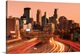 image thumbnail of USA, Minnesota, Minneapolis, city skyline from interstate highway I-35W, dawn