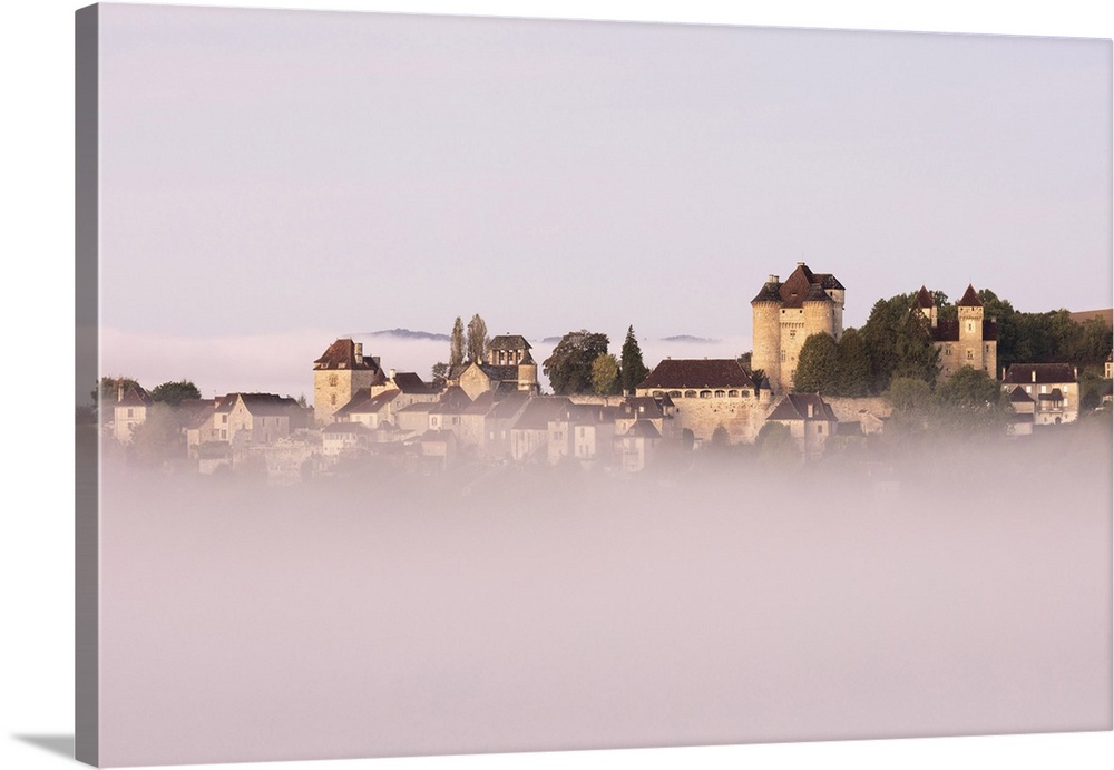 Curemonte labelled l'un des plus beaux villages de France (most beautiful villages in France) in the morning mist, Correze...
