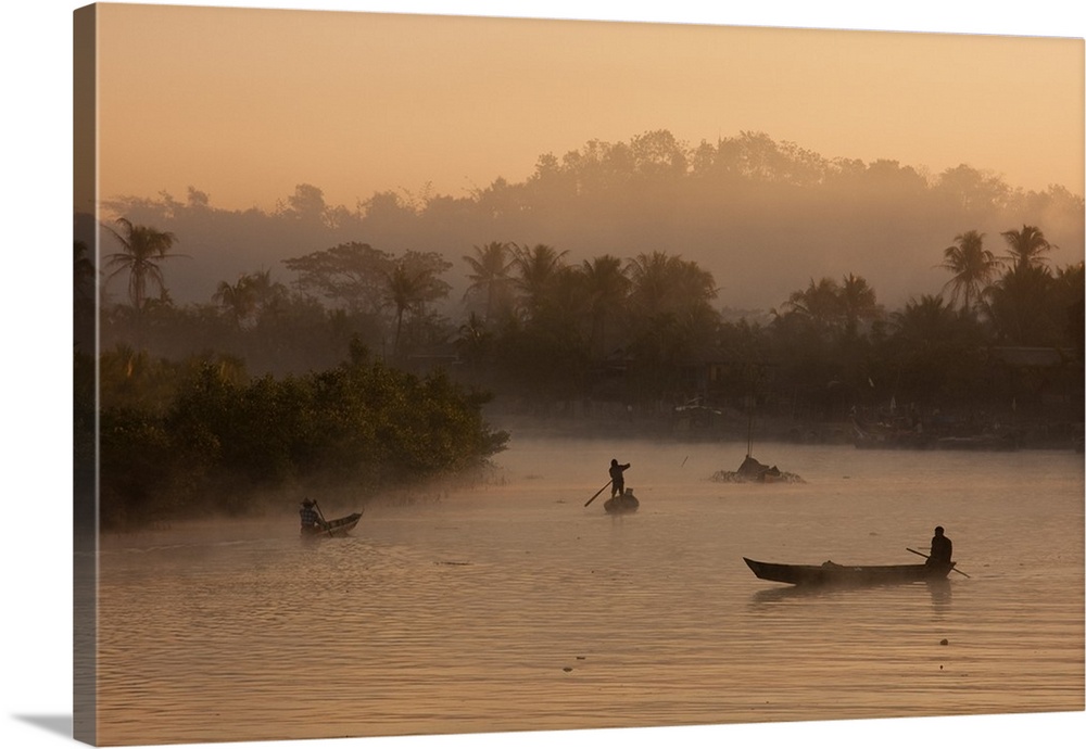 Myanmar, Burma, Mrauk U. Early morning mist rising on the Aungdat Creek, entering the ancient city of Mrauk U, Rakhine State.