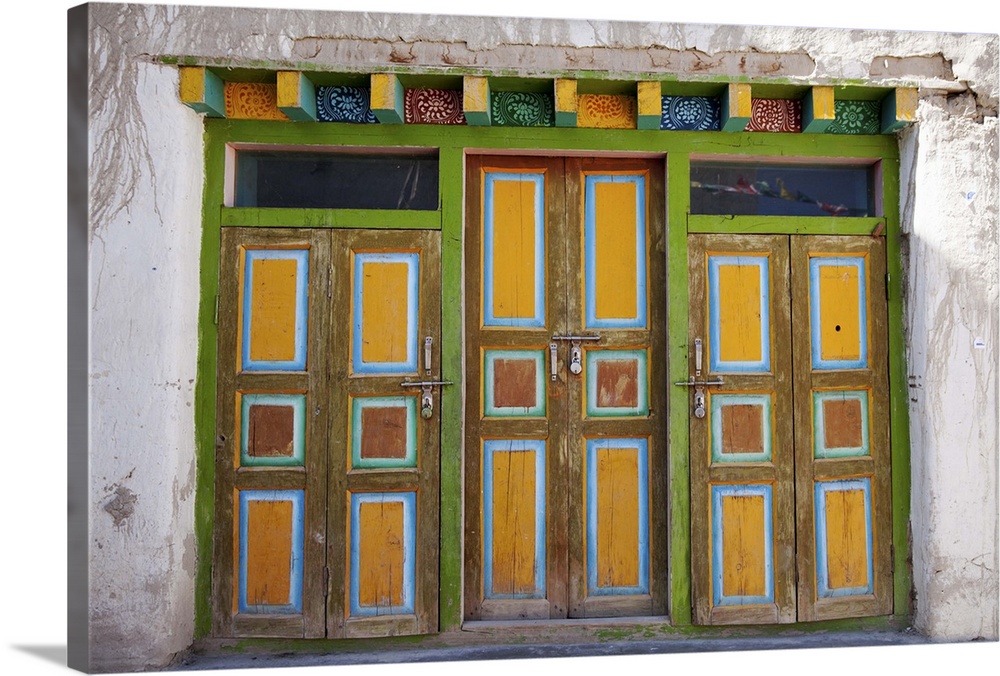 Nepal, Mustang, Lo Manthang. Brightly painted doors in the ancient capital of Lo Manthang.