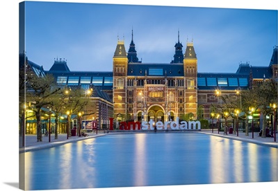 Netherlands, North Holland, Amsterdam. The Rijksmuseum on Museumplein at dusk