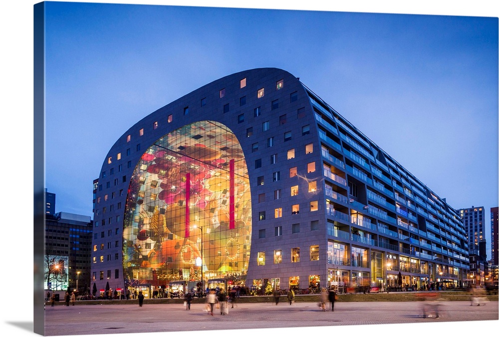 Netherlands, Rotterdam, Markthal foodhall, exterior, dusk.