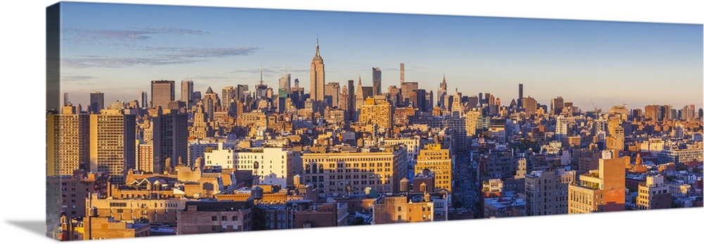 USA, New York, New York City, Lower Manhattan, Mid-town Manhattan skyline, elevated view, sunset