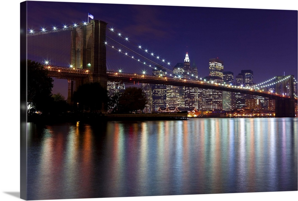 USA, New York City, Manhattan,  Brooklyn Bridge and the Downtown Manhattan Financial District skyline at dusk