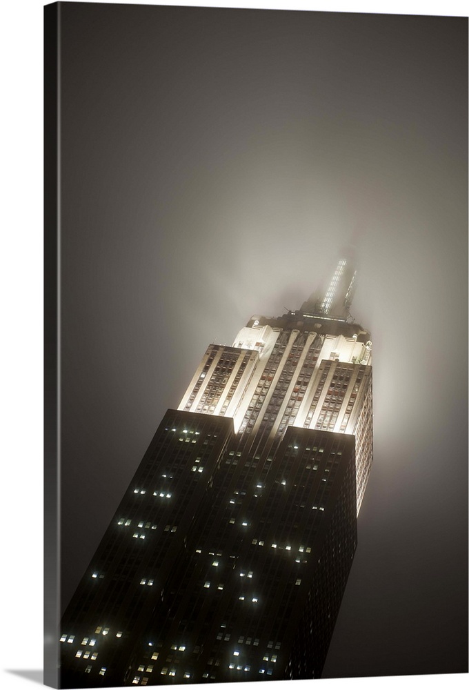 USA, New York City, Manhattan, Empire State Building on a rainy evening- low angle view