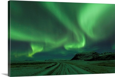 Northern Lights, Aurora Borealis, Winter road with snow, Iceland