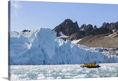 Norway, Visitors forge a way through brash ice towards the spectacular Monaco Glacier