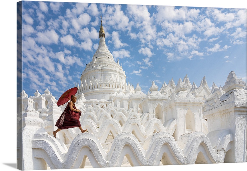 Novice monk running and jumping at Hsinbyume pagoda, Mingun, Mandalay, Sagaing Township, Sagaing District, Sagaing Region,...