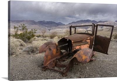 Old Car Abandoned Near Ballarat Ghost Town In Death Valley National Park, California