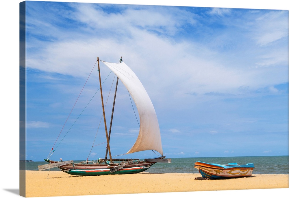 Oruwa (outrigger canoe) on Negombo beach, Western Province, Sri Lanka.