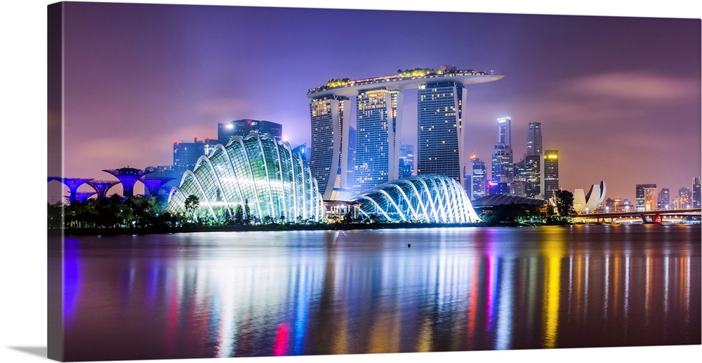 Panoramic of Marina Bay Sands and Gardens by the Bay at night, Singapore.