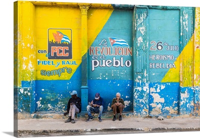 People Sitting On A Street Corner In La Habana Vieja (Old Town), Havana, Cuba