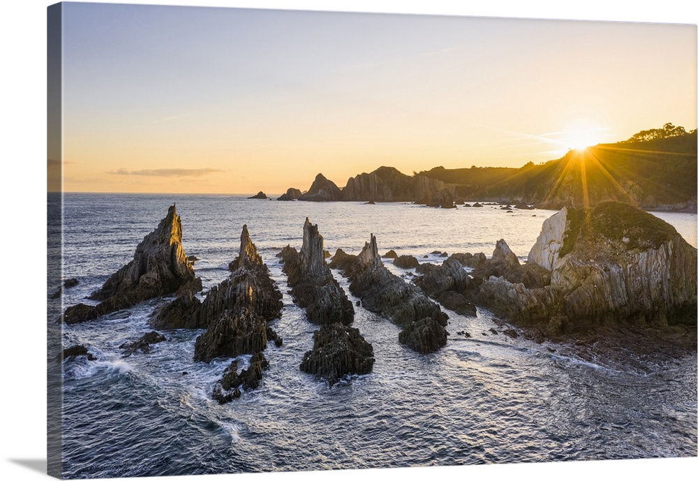 Playa Gueirua, Santa Marina, Asturias, Spain. La Forcada (The Pitchfork) sea stacks at sunrise