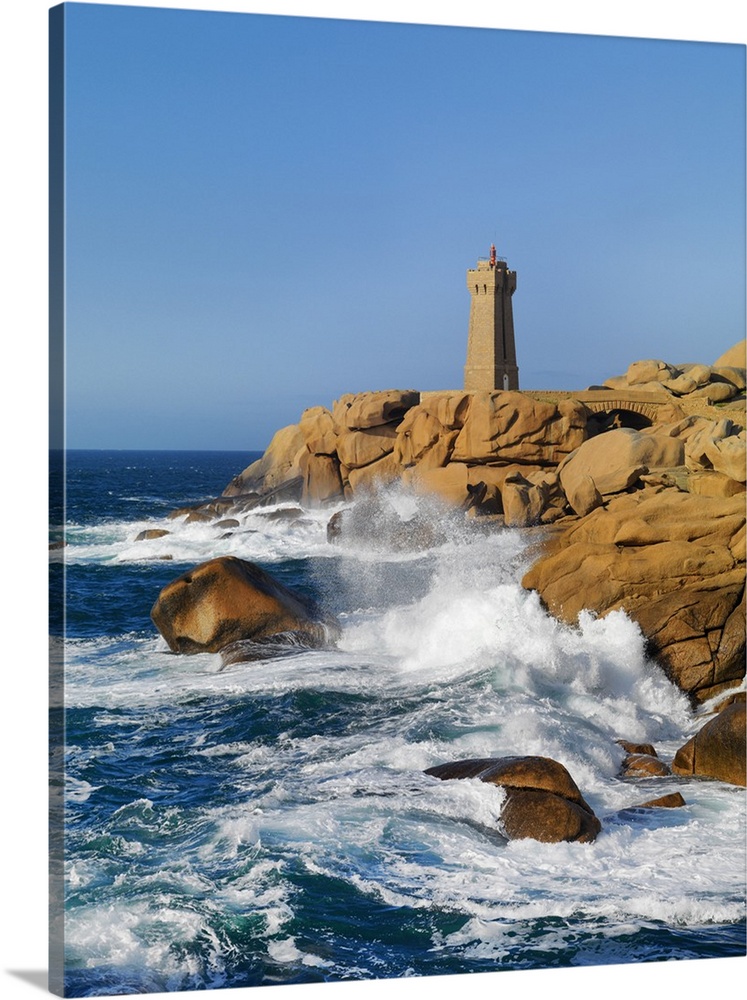 Ploumanach lighthouse on the Cote de Granit Rose (Pink Granite Coast), Cotes d'Armor, near Perros-Guirec, Brittany, France...