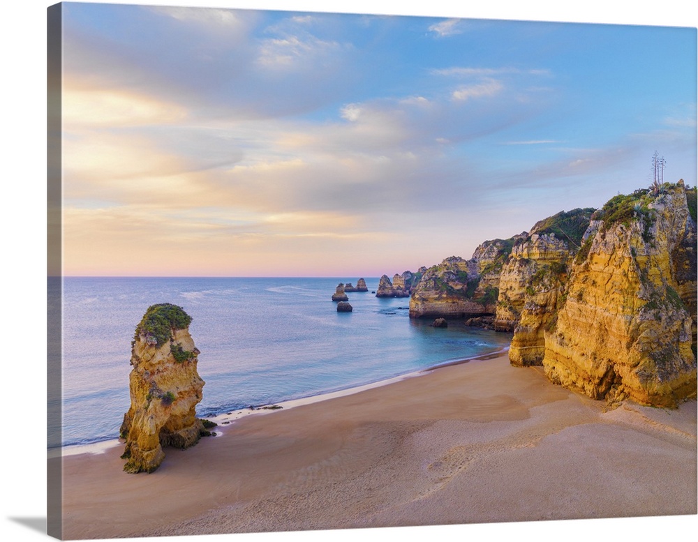 Portugal, Algarve, Lagos, Praia da Dona Ana, rock formations at dawn