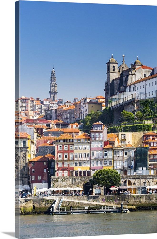 Portugal, Douro Litoral, Porto. The view across the Douro River to the UNESCO listed Old Town of Porto.