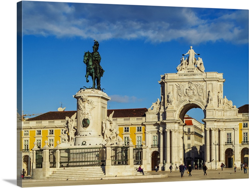 Portugal, Lisbon, Commerce Square, View of the Statue of King Jose I by Machado de Castro and the Rua Augusta Arch.